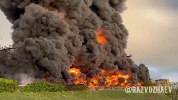 An oil tank on fire. 